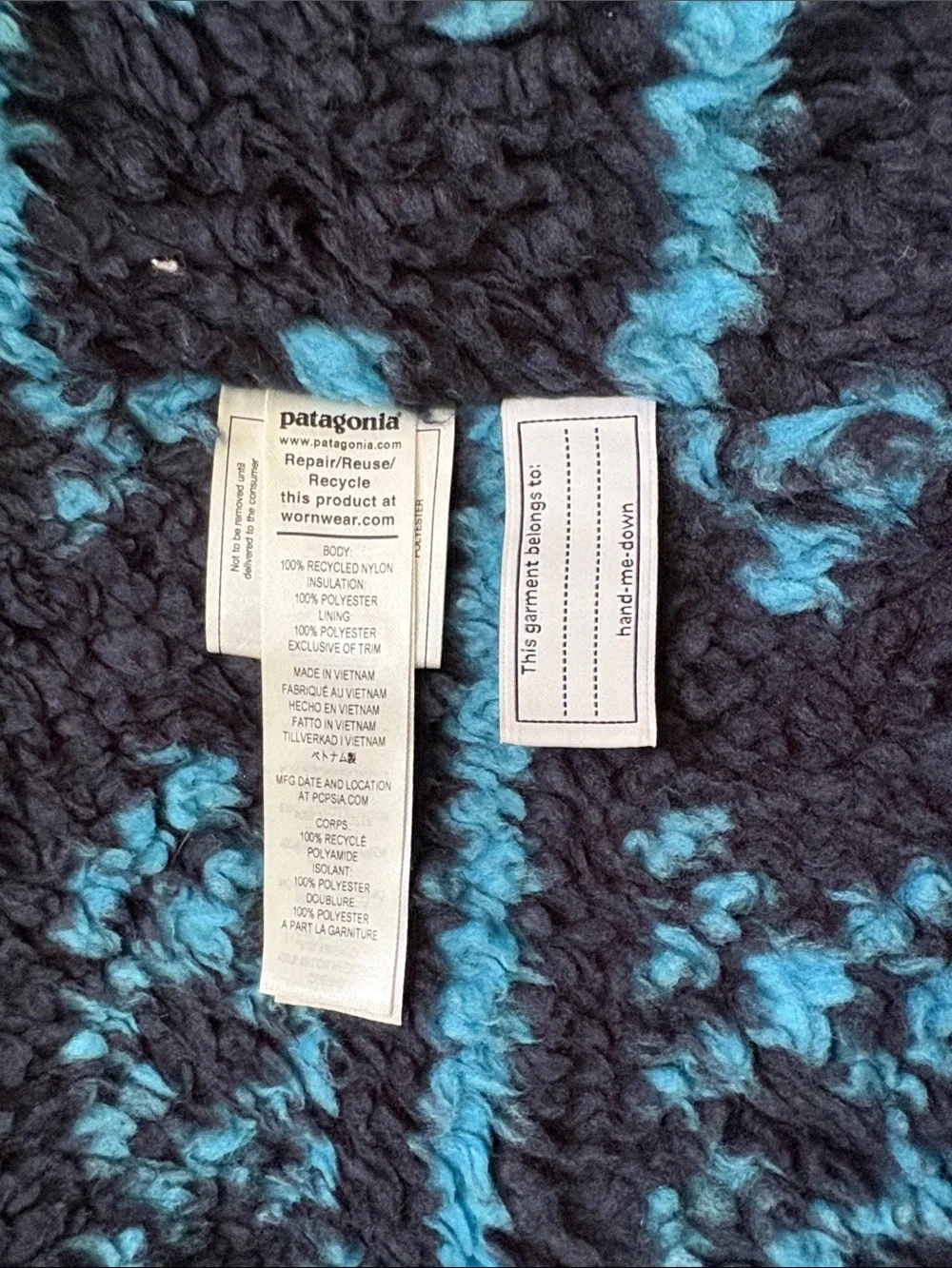 Patagonia Boys Infurno Hooded jacket in Charcoal Gray with Blue Lined Hood